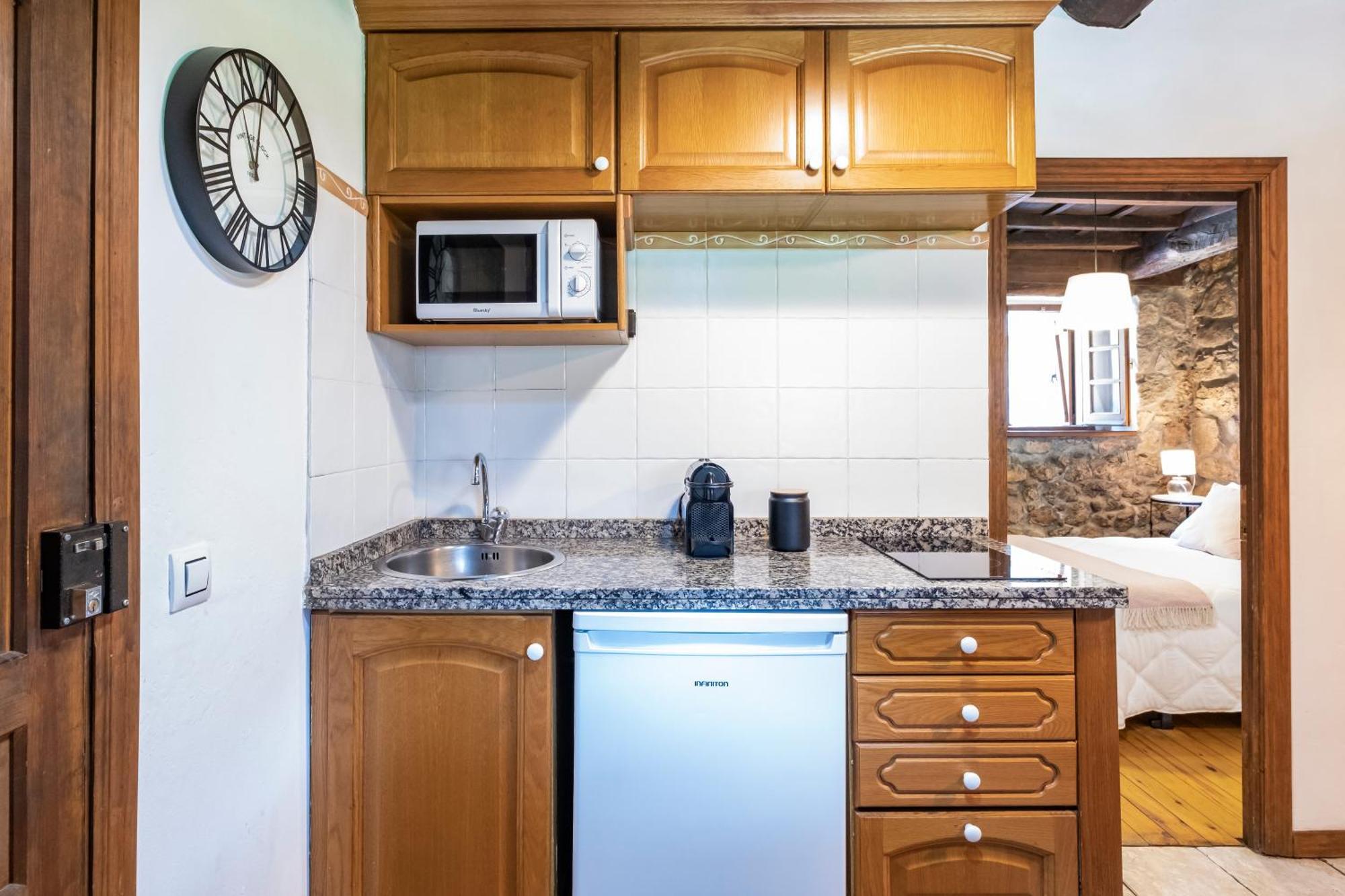 Apartamentos Rurales La Laguna Somiedo Valle de Lago ภายนอก รูปภาพ