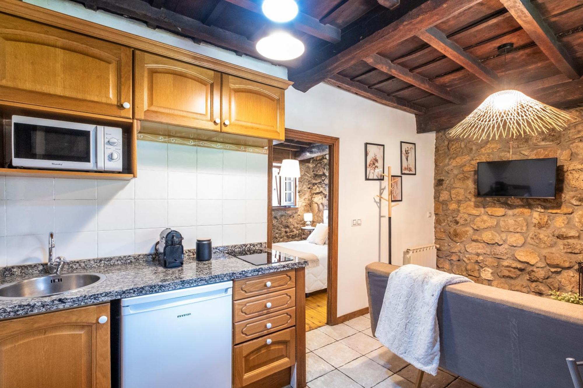 Apartamentos Rurales La Laguna Somiedo Valle de Lago ภายนอก รูปภาพ